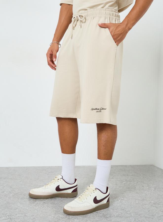 Styli Men Beige Graphic Oversized T-Shirt and Shorts Co-Ords - Image 4